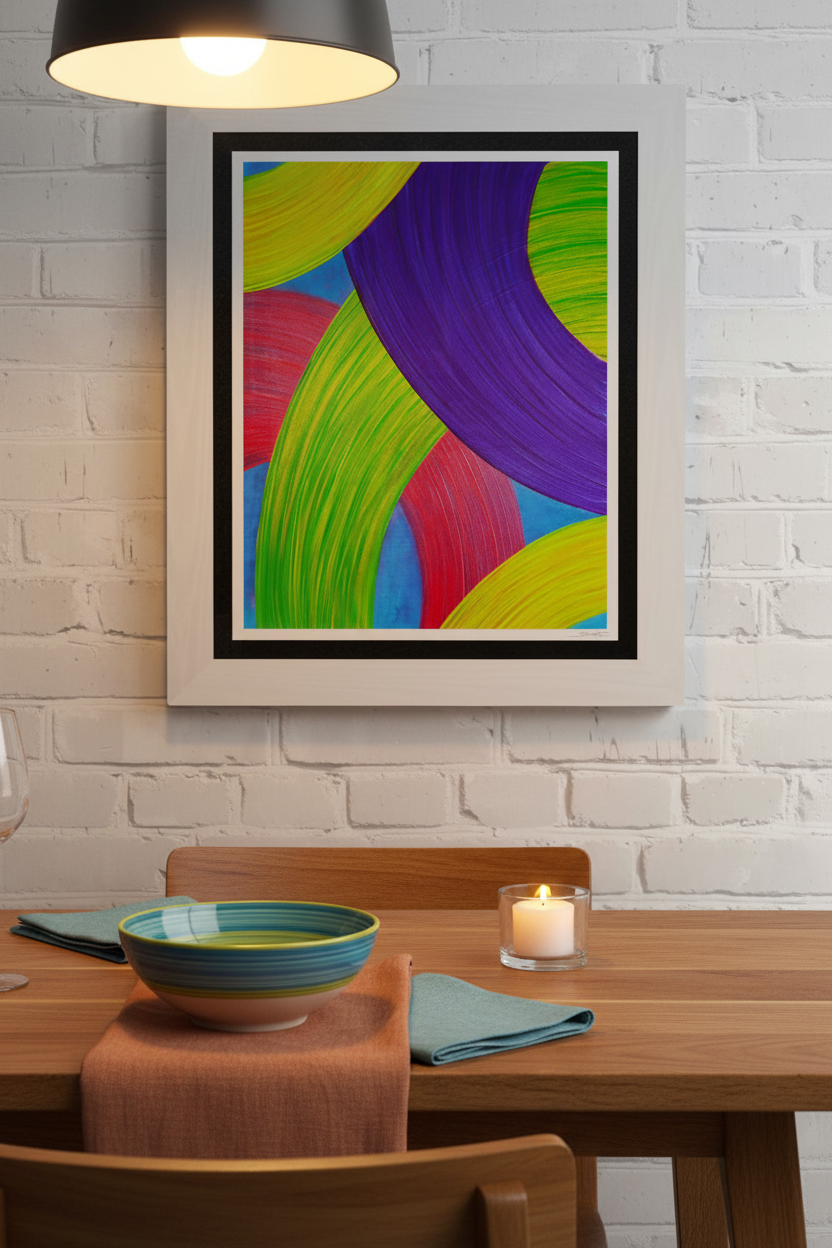 Ballet of Ribbons giclée print above a wood dining table with colorful ceramic bowl, linen napkins and candle